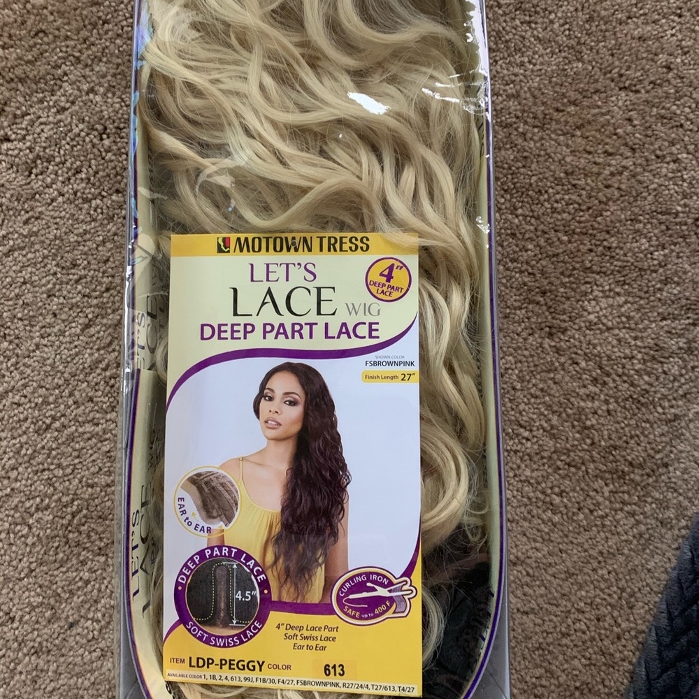 Curly blonde wig! Brand new! Never worn!